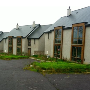 The Tannery - Before - run-down, faded with unkempt lawns
